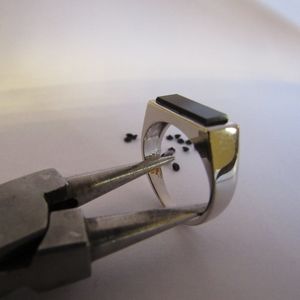 14K white gold with black Onyx.